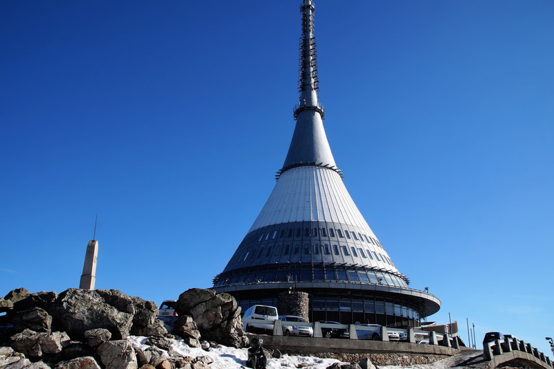 Hotel and TV tower atop Ještěd mountain on the outskirts of Liberec. Photo courtesy of Pixabay.