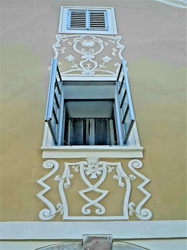 Elaborate decoration on a Kutná Hora house