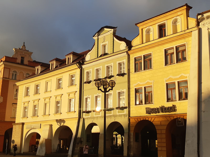 Sunlight on row houses on "Great Square" (Velké Náměstí) in Hradec Kralove