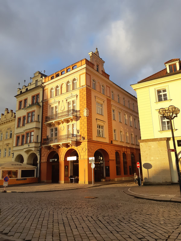 Sunlight on row houses on "Great Square" (Velké Náměstí) in Hradec Kralove